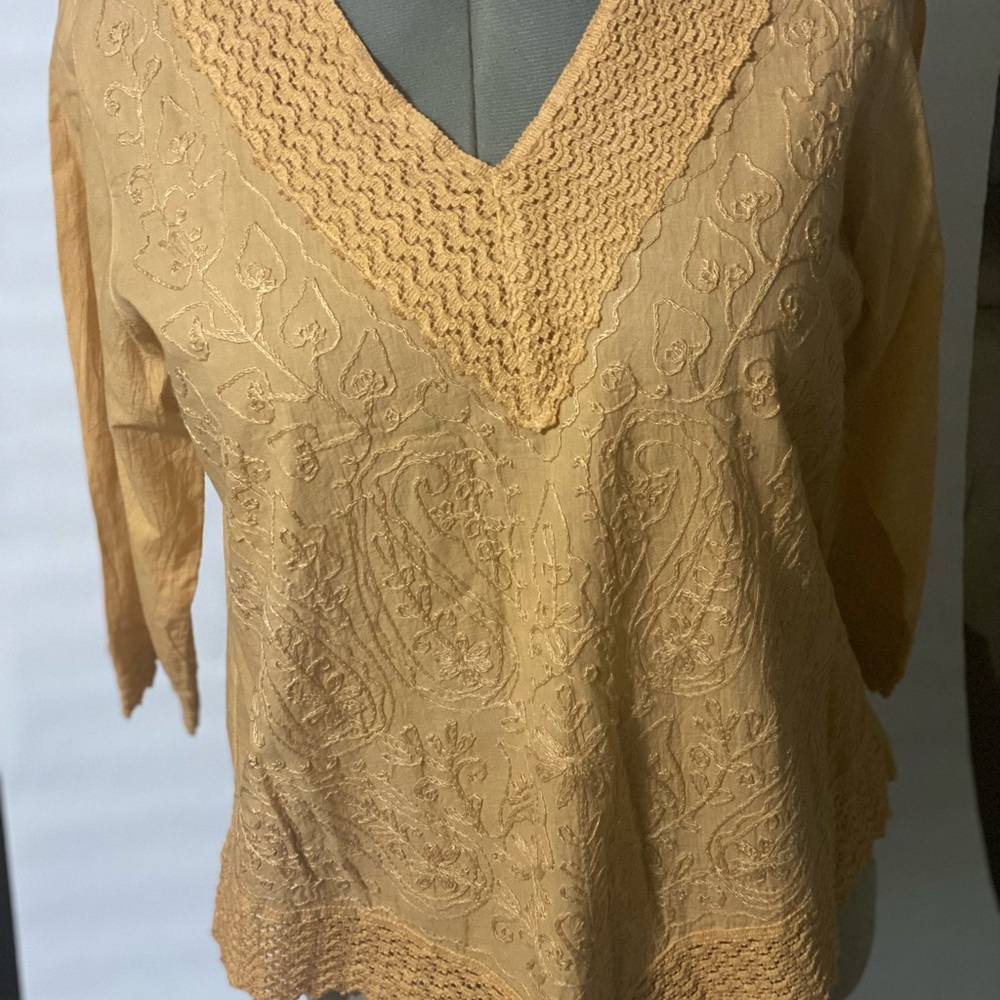 Yellow cotton embroidered long sleeve top.